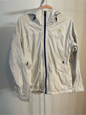 The North Face women’s large  White Hooded Rain Jacket with Navy Zip